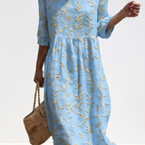 Amélie - Robe féminine décontractée à motifs floraux.